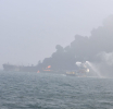 Fires still burning and one missing after tanker collision