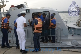 Navy brings ill fishermen ashore for immediate treatment