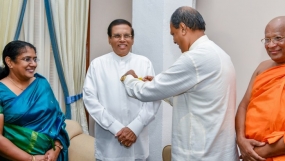 First flag marking National Prisoners’ Day pinned on President