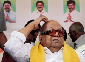 Karunanidhi accepts defeat; congratulates Modi