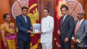 Book on irrigation titled, “Hela Wari Purawatha” presented to the President