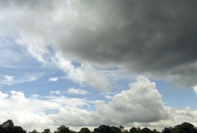 Cloudy Skies with showers